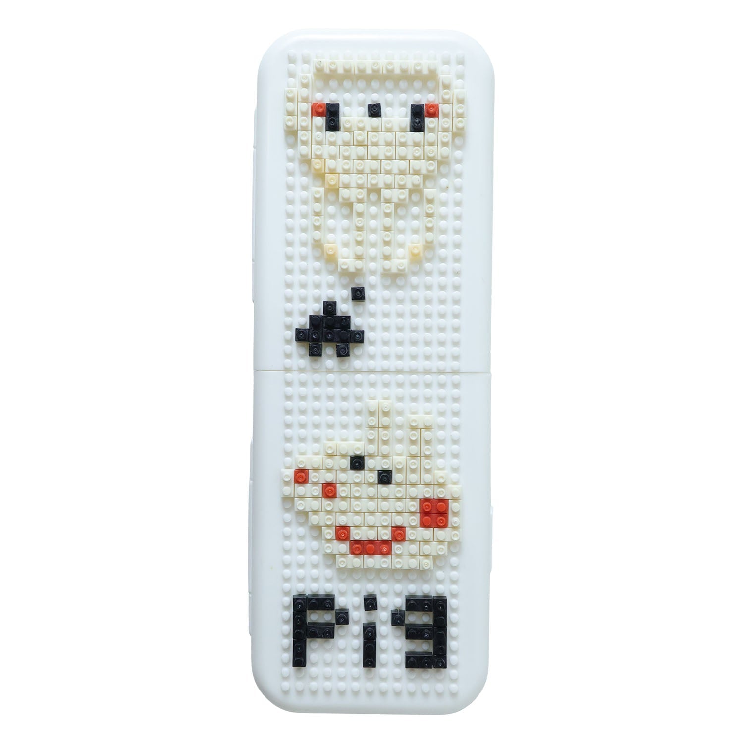 Decorative pen holder with pixel art design on an organized desk