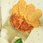 Packaged Maniarr's Pizza Mini Slim Bites with clear pizza flavour branding and nutritional info.