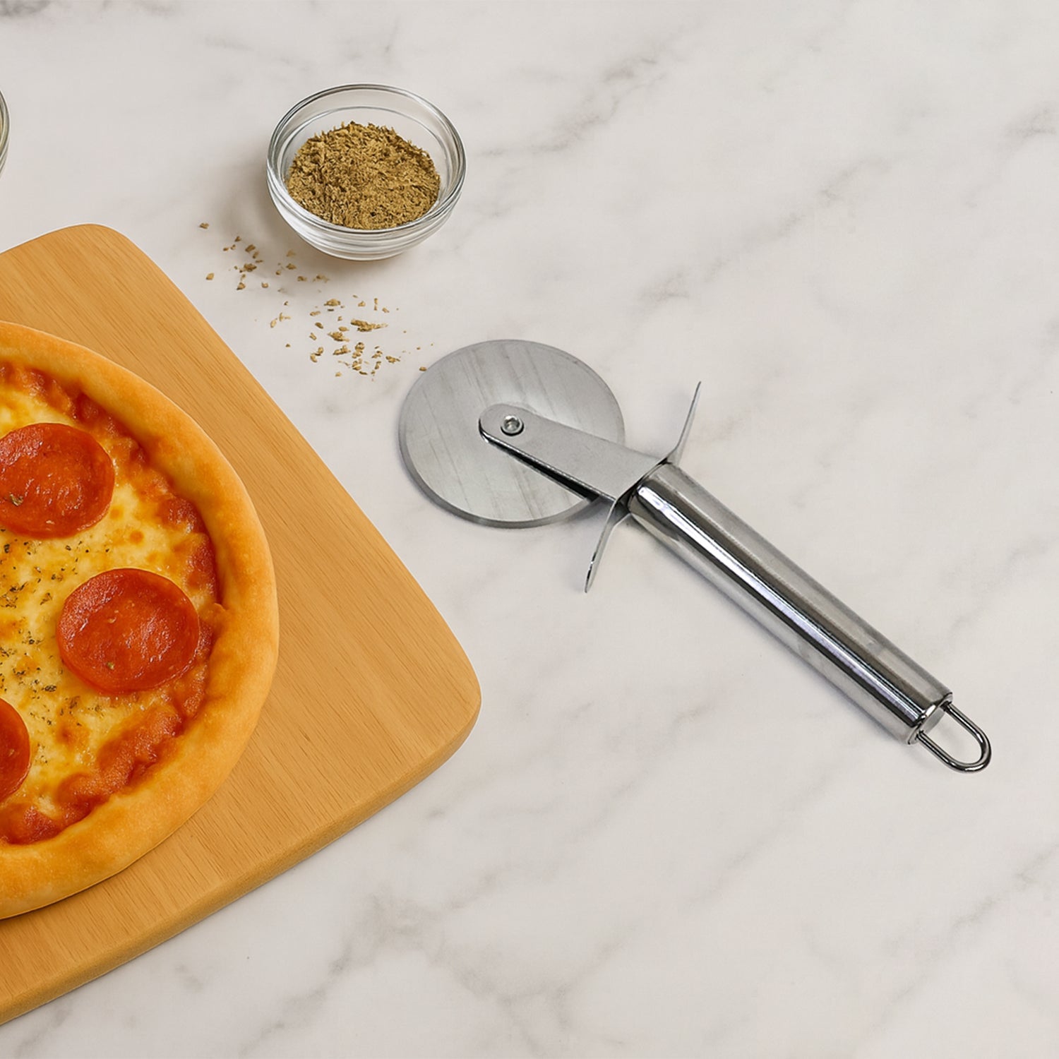 Close-up of ergonomic handle on pizza cutter wheel