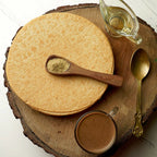 Close-up of a single round Plain Khakhra, showcasing its hand-roasted finish.