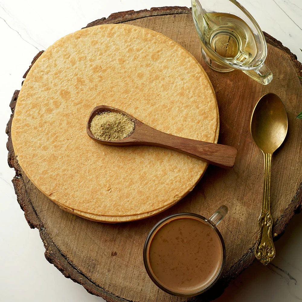 Close-up of a single round Plain Khakhra, showcasing its hand-roasted finish.