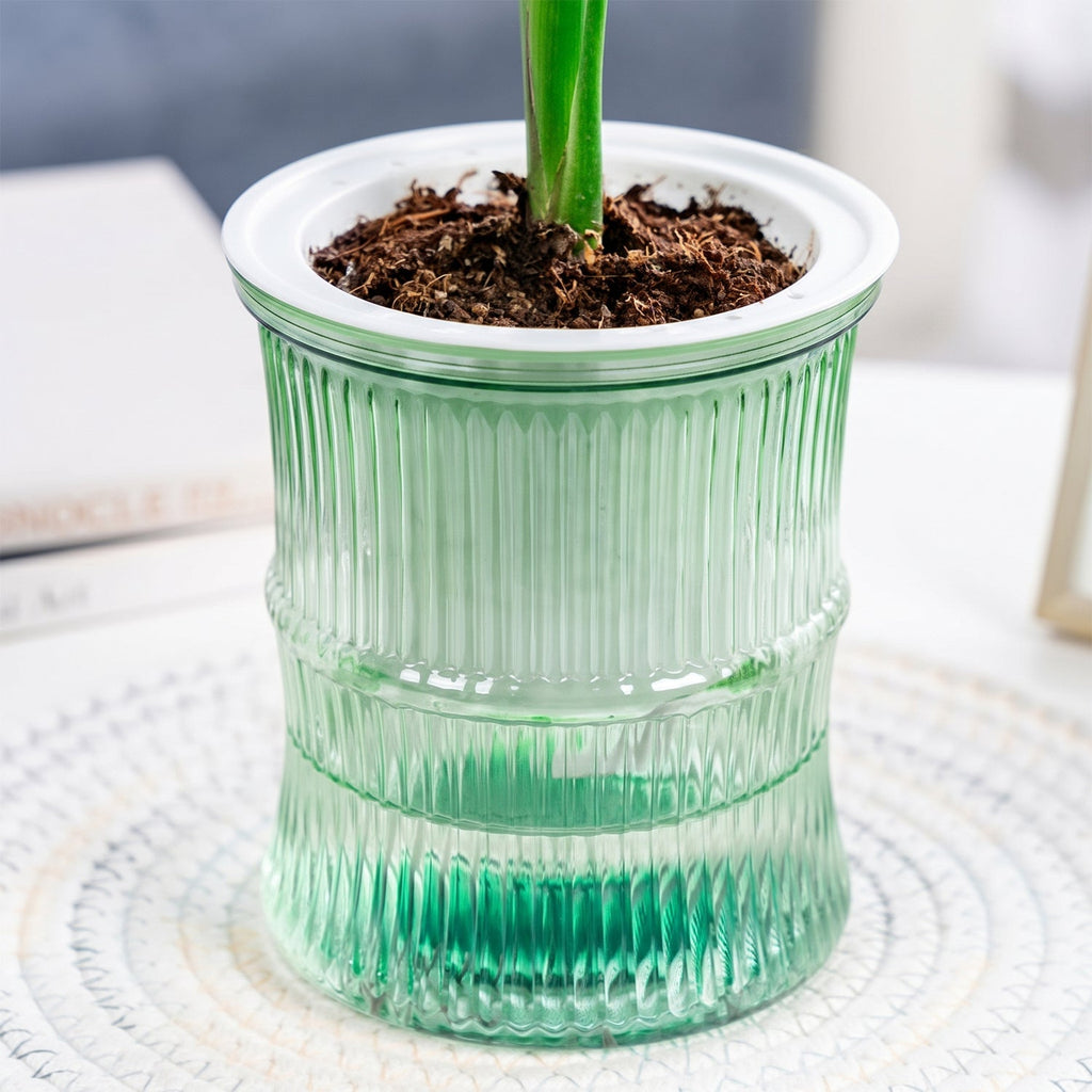 Side view of bamboo-style self-watering planter pot