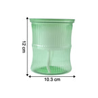 Close-up of bamboo style self-watering flower pot