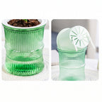 Top view of plastic self-watering bamboo style flower pot