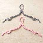 Skid-proof foldable hanger preventing clothes from slipping off
