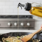 Transparent oil dispenser with flip top for oil, vinegar, sauces