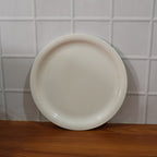 Lightweight and sturdy round serving plate for diverse kitchen needs