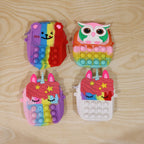 Kids pop it silicone shoulder bag showcased as playful fidget toy and purse