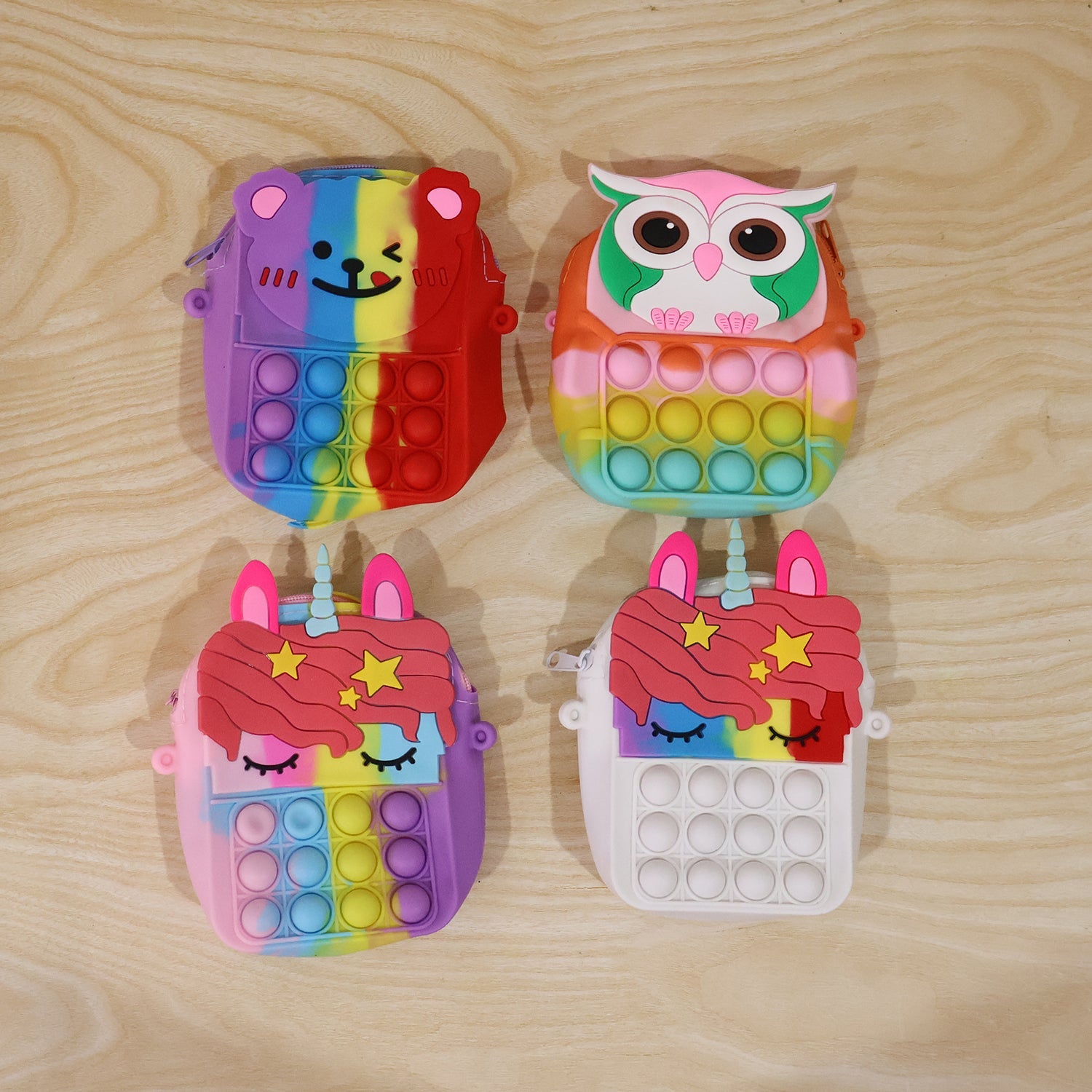 Kids pop it silicone shoulder bag showcased as playful fidget toy and purse