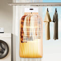 Portable electric clothes dryer drying garments in hot air circulation