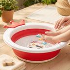 Foldable baby bathtub with non-slip base, crown shape, and cow face design for infants