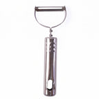 Stainless steel peeler on kitchen counter with peeled vegetables