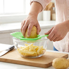 Indo Glow potato cutter demonstrating its smooth and efficient slicing action.