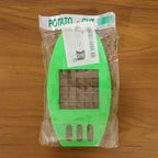 Disassembled Indo Glow potato cutter parts, showing the blade insert and base for easy cleaning.