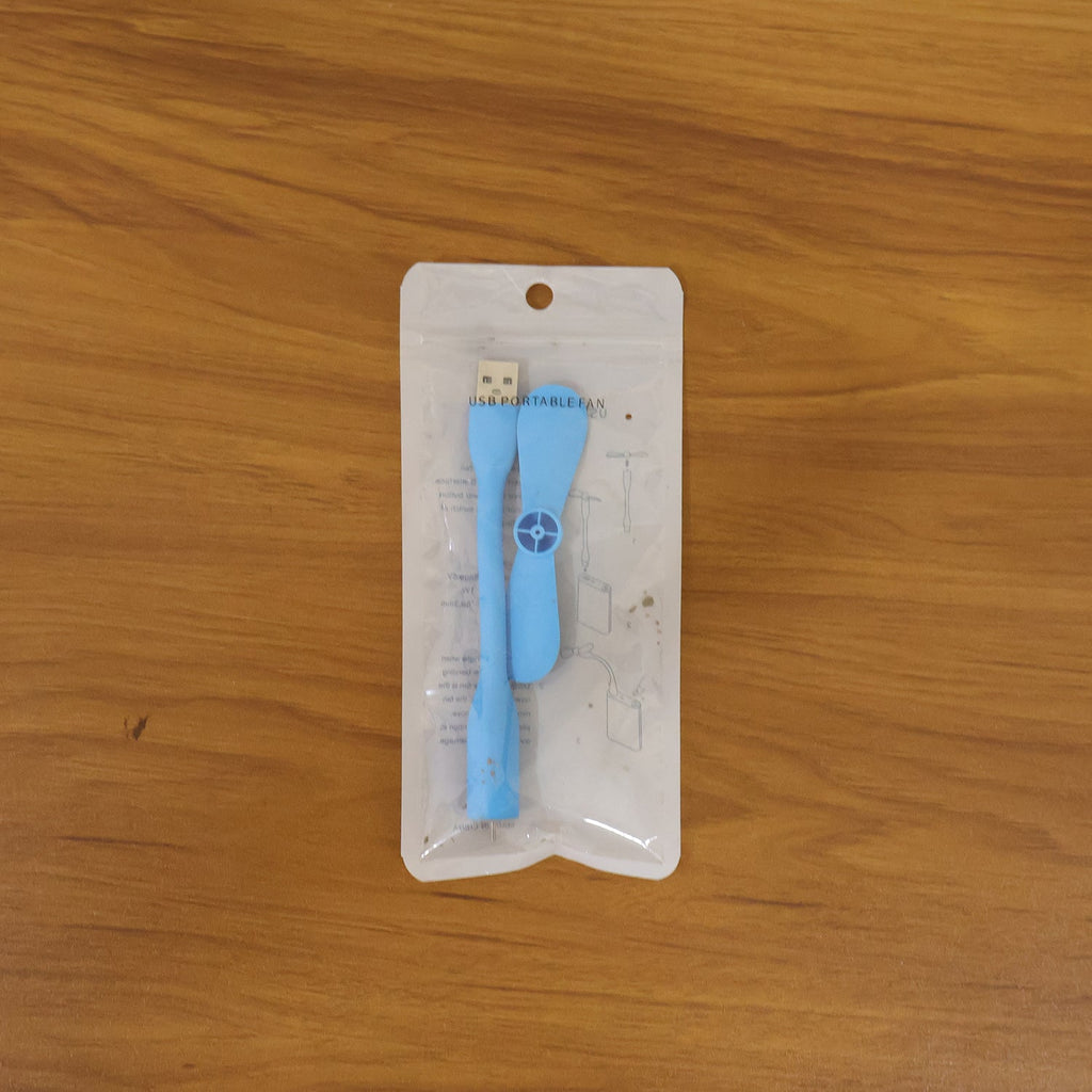Portable USB mini fan in use for cooling on-the-go