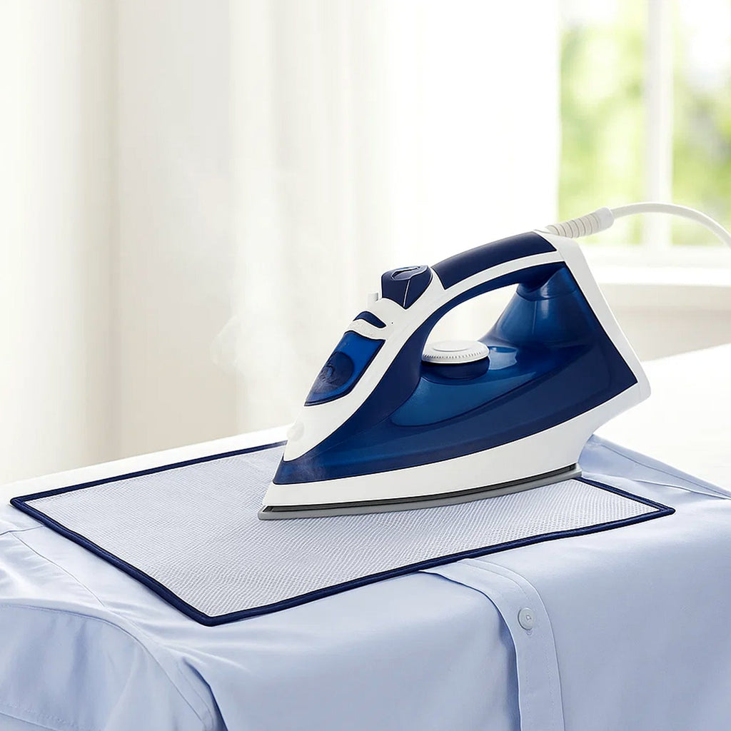 Hand holding transparent heat-resistant ironing mesh press cloth