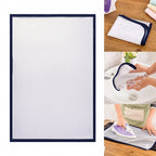 Person using heat-resistant ironing mesh cloth while ironing a garment