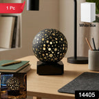 Close-up of star projector night lamp displaying elegant star pattern illumination