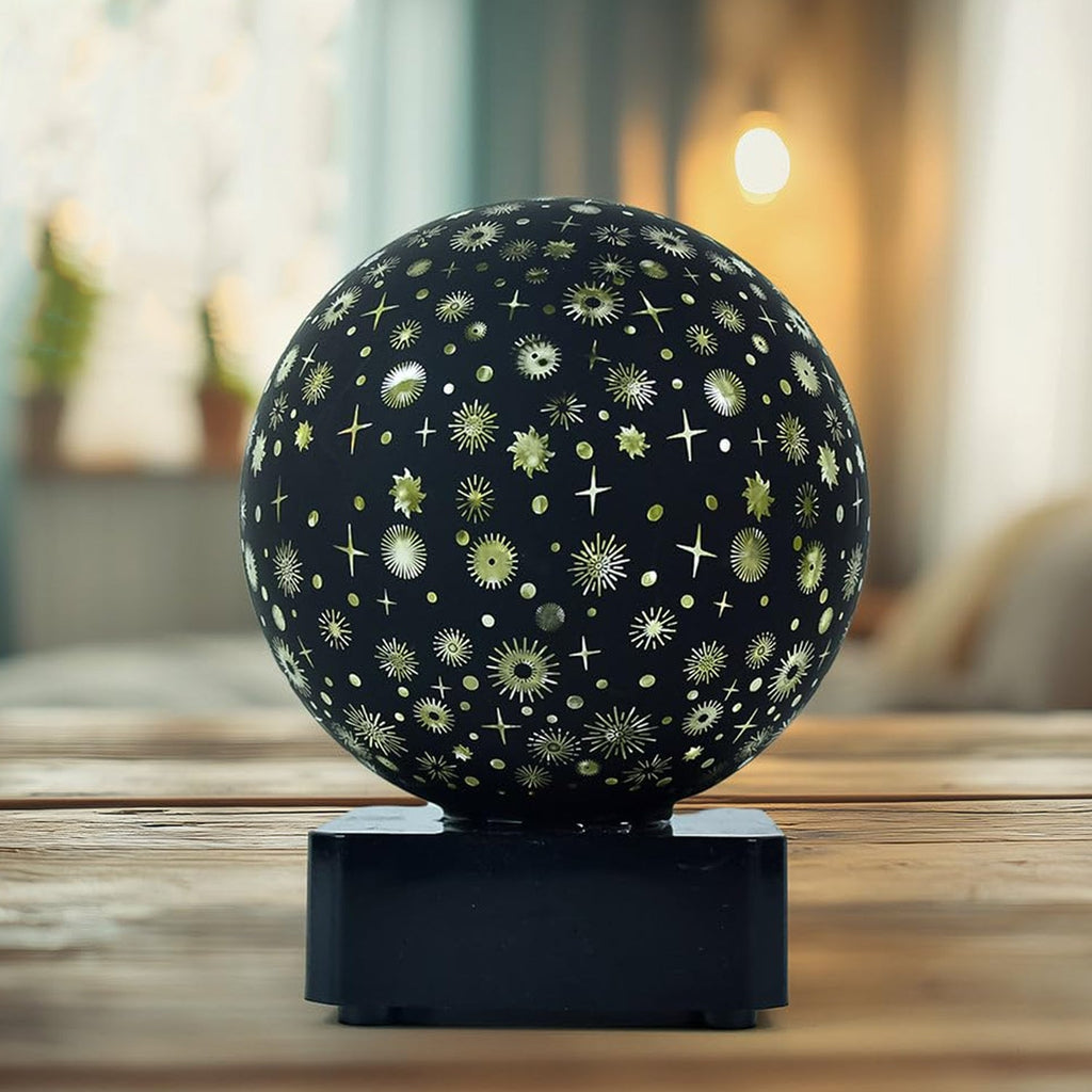 LED projection night lamp showing star pattern glowing softly