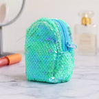Open sequin zipper pouch revealing the soft inner lining and ample space.