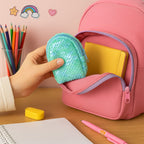Sequin pouch held in hand, demonstrating its compact size and portability.