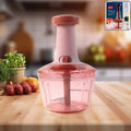 Manual vegetable chopper with 800 ML capacity and sharp blades on countertop