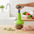 Push-Down manual vegetable chopper displaying transparent container and handle