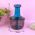 Compact design of manual push chopper vegetable cutter for kitchens.