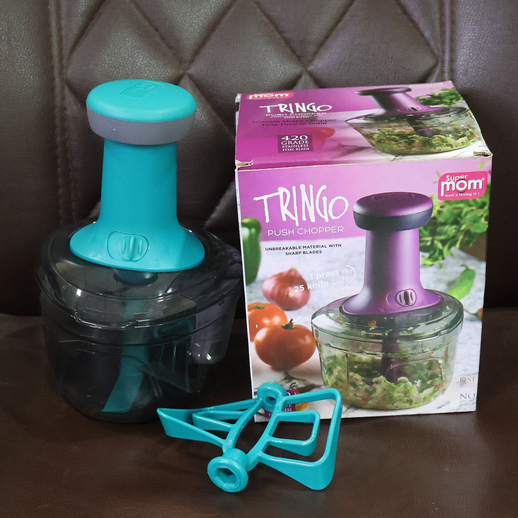 Ergonomic manual vegetable and nut chopper for kitchen use.