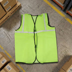 Close-up of the durable polyester fabric and reflective strips on the safety jacket.