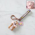 Cute cartoon animal silicone keychain with rainbow strap attached to keyring