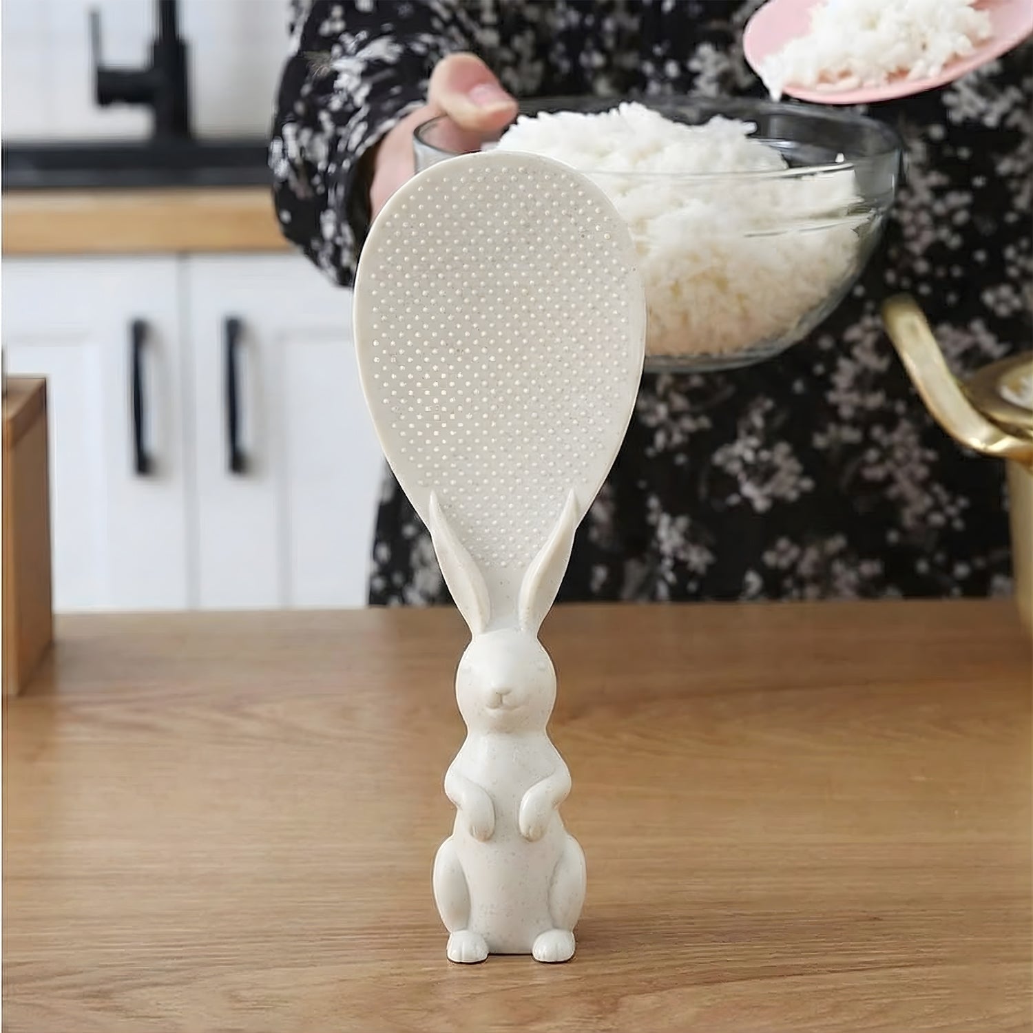 Side view of rice spoon with cute bunny handle design