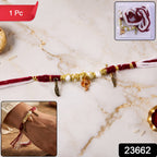Red and white thread rakhi with Ganesh charm and beads