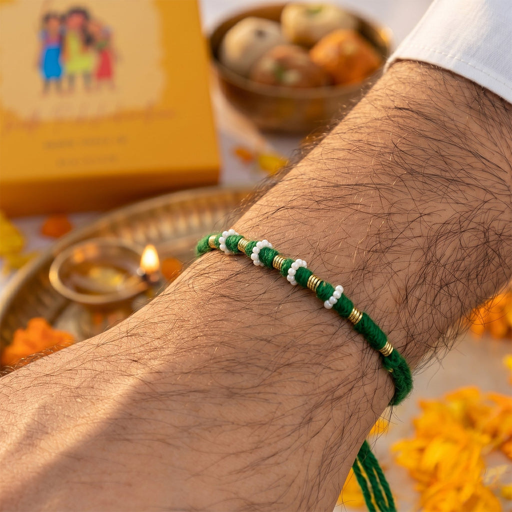 Festive traditional green rakhi with golden bead detailing
