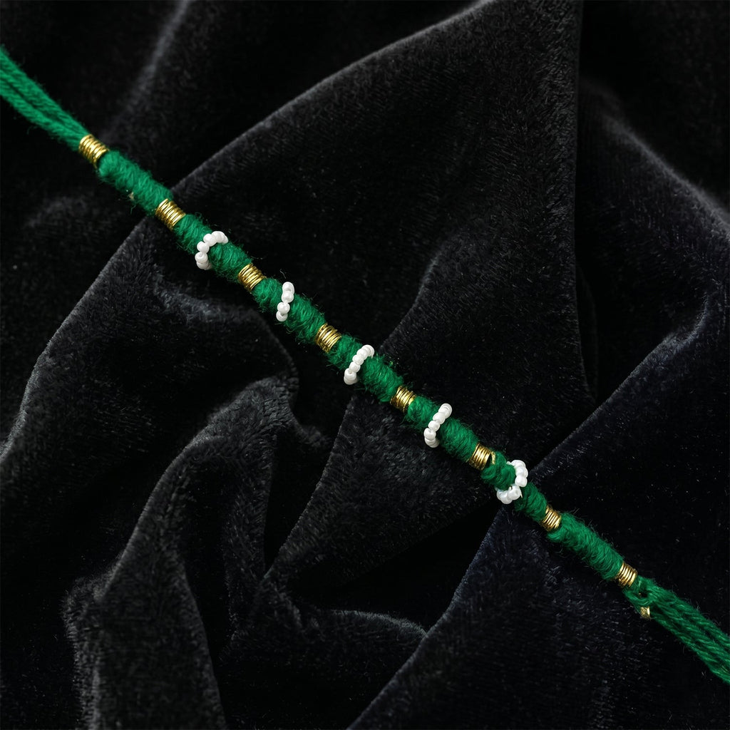 Close-up of green pearl beaded rakhi design