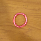 Strong elastic hair coil band for secure ponytails and buns