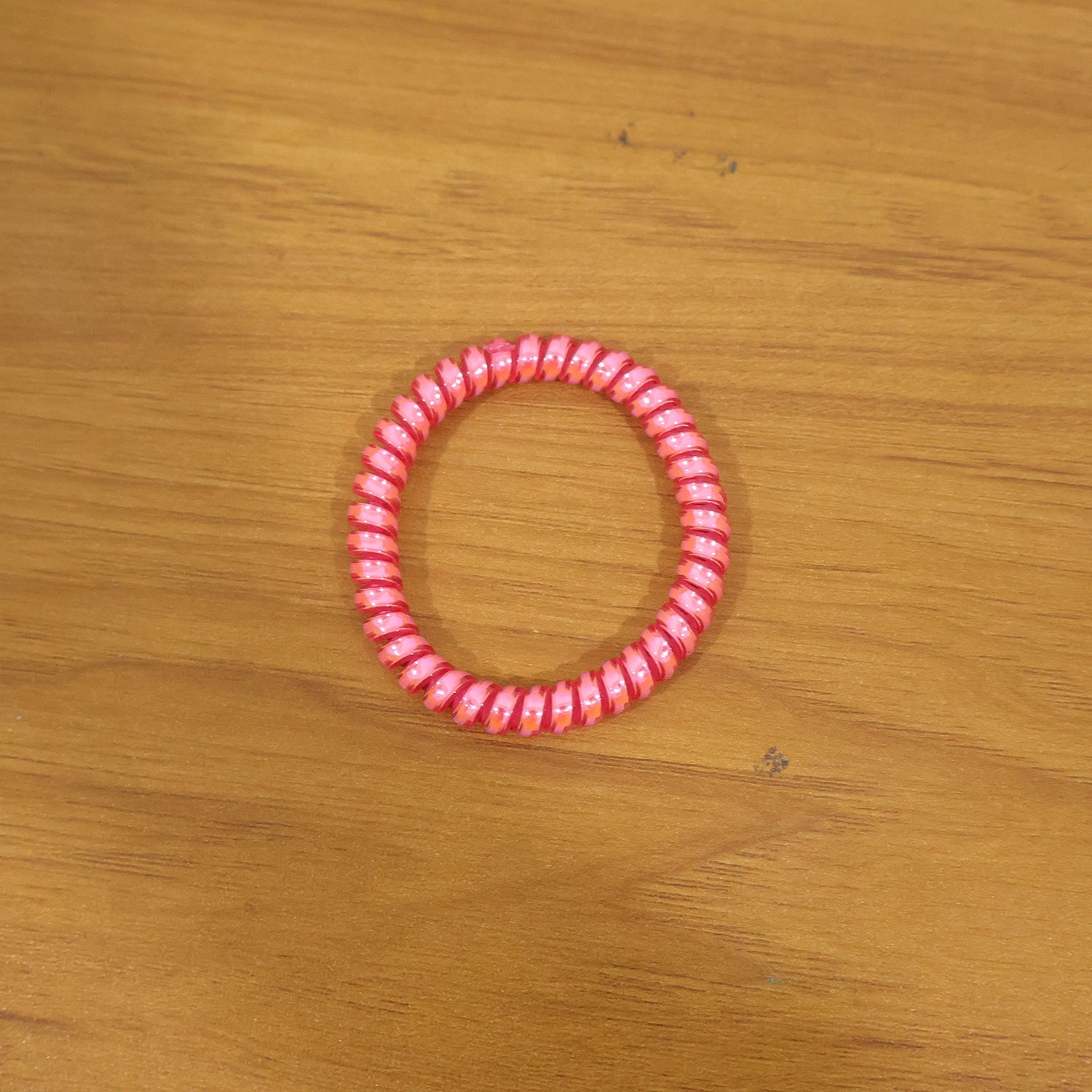 Strong elastic hair coil band for secure ponytails and buns