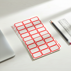 Self-adhesive label sheets in red for easy application