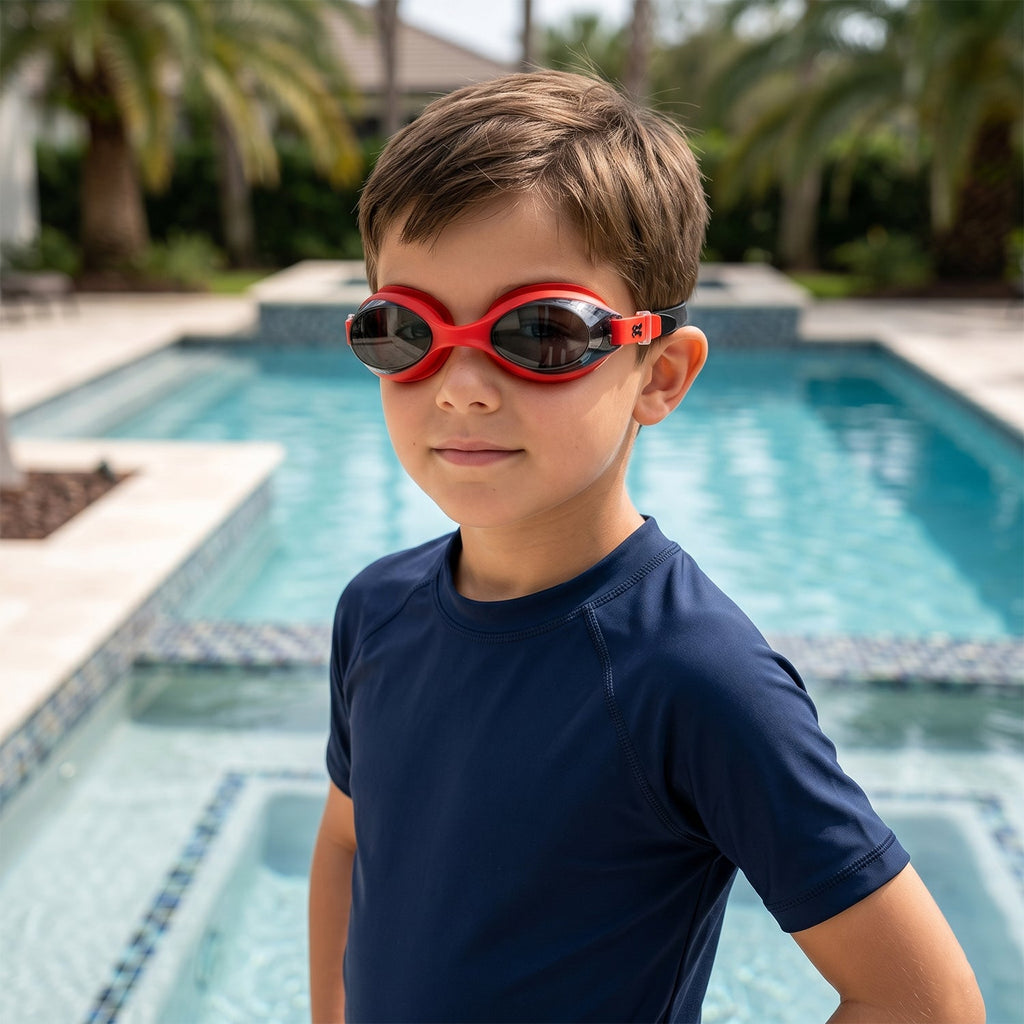 Angled view of red swimming goggles highlighting leakproof design
