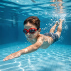 Red anti-fog swimming goggles with adjustable strap suitable for all ages