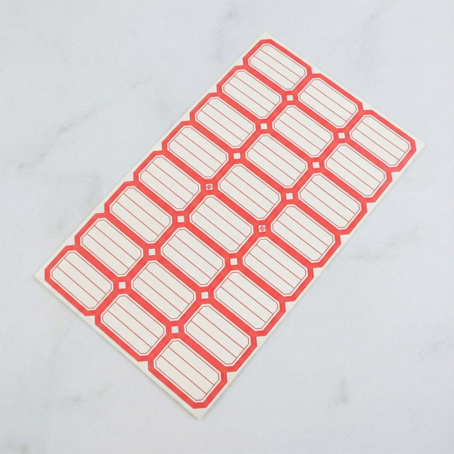 Close up of self-adhesive rectangular label stickers applied on jars