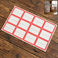 Red and white rectangular self-adhesive label sticker sheet on white background