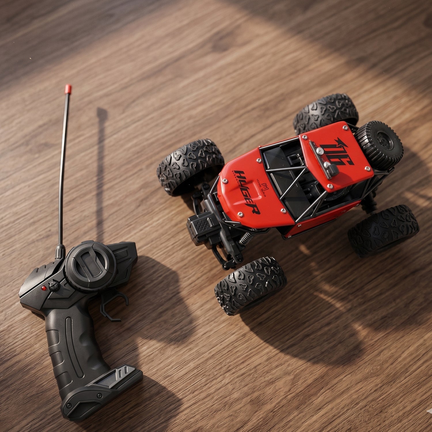Close-up of the Rock Crawler RC Truck's wheel and robust suspension system.