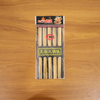 Lifestyle image showing bamboo chopsticks used for Asian meal