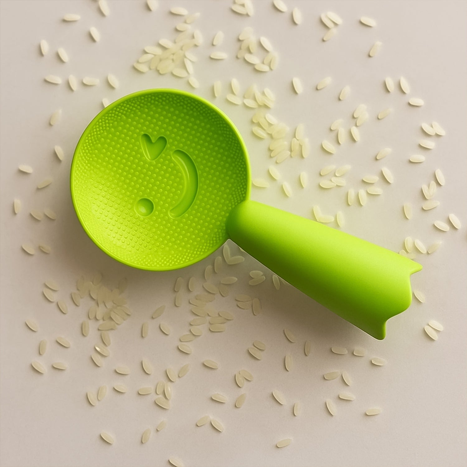 Textured rice paddle designed to prevent rice from sticking while serving