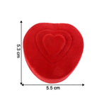 Heart-shaped ring holder showcasing cushioned ring slot inside velvet box
