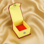 Open ring gift box showing soft velvet cushion and snap closure
