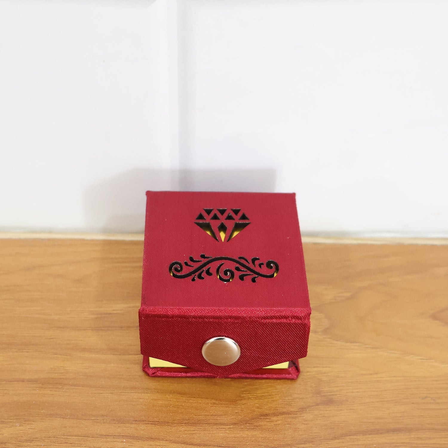 Ring gift box displayed in an elegant setting for jewelry presentation
