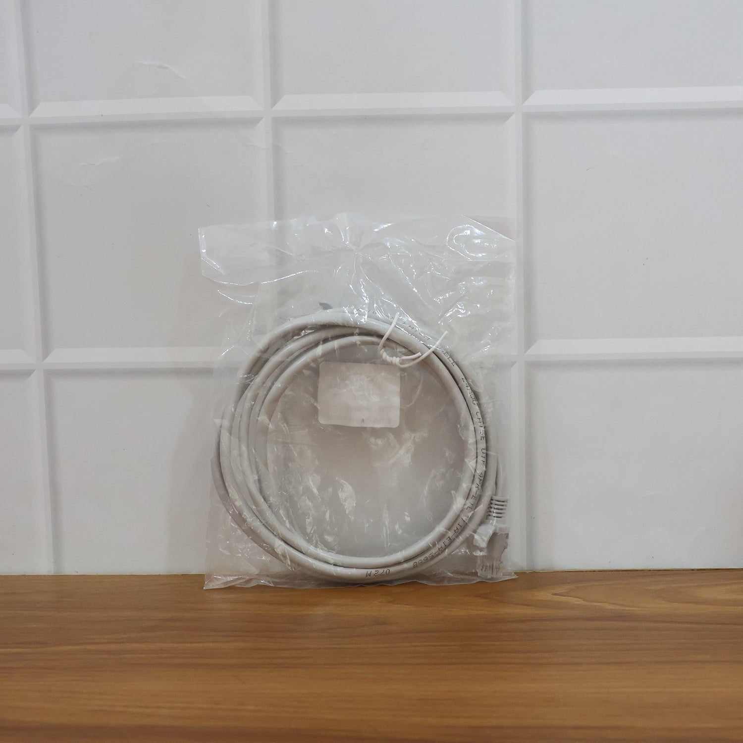 In-use high-speed LAN Ethernet cable connecting devices in office