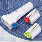 Plastic tube squeezer placed neatly on bathroom counter